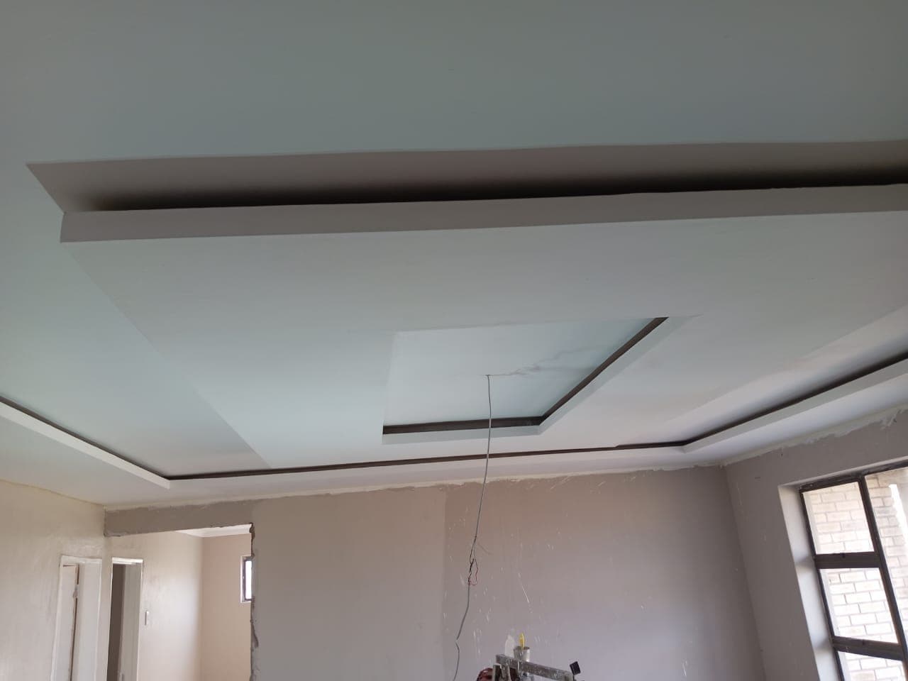 Ceiling installation work by Kannjane Consultants, Komani